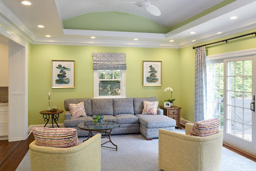 pastel green living room with chaise