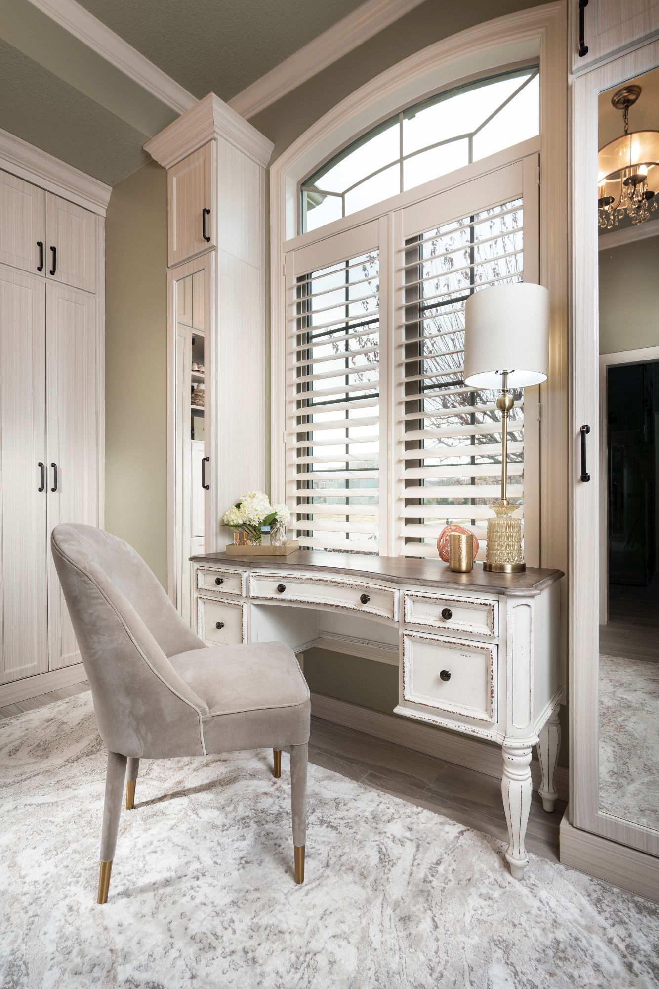 Custom closet space and powder room in a traditional closet in Upper Montclair.