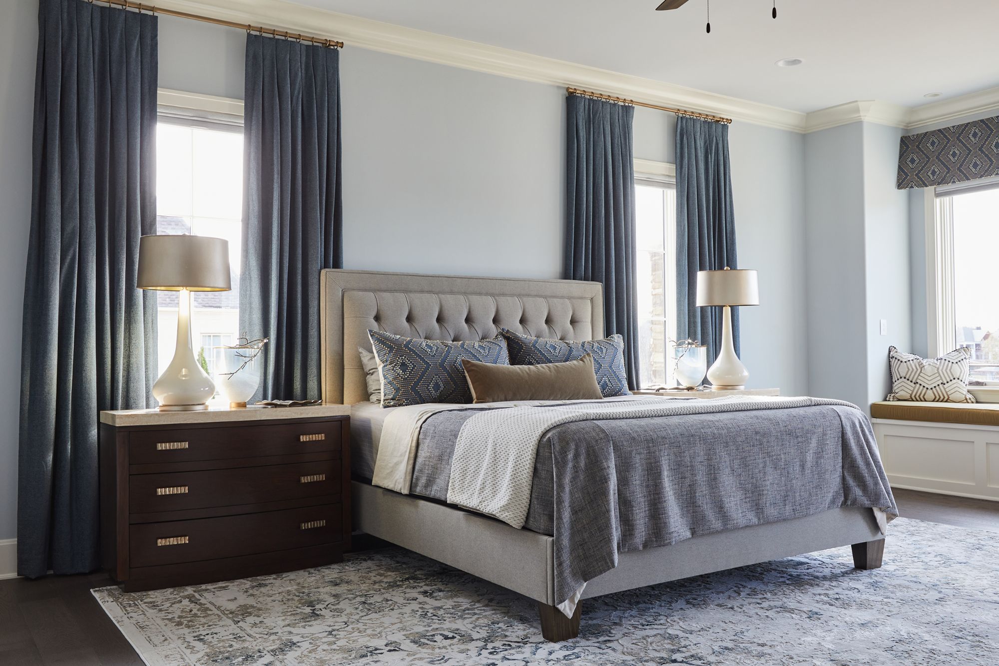 Transitional master bedroom suite interior decorating project by professional decorating firm, Valerie Ruddy Designs.