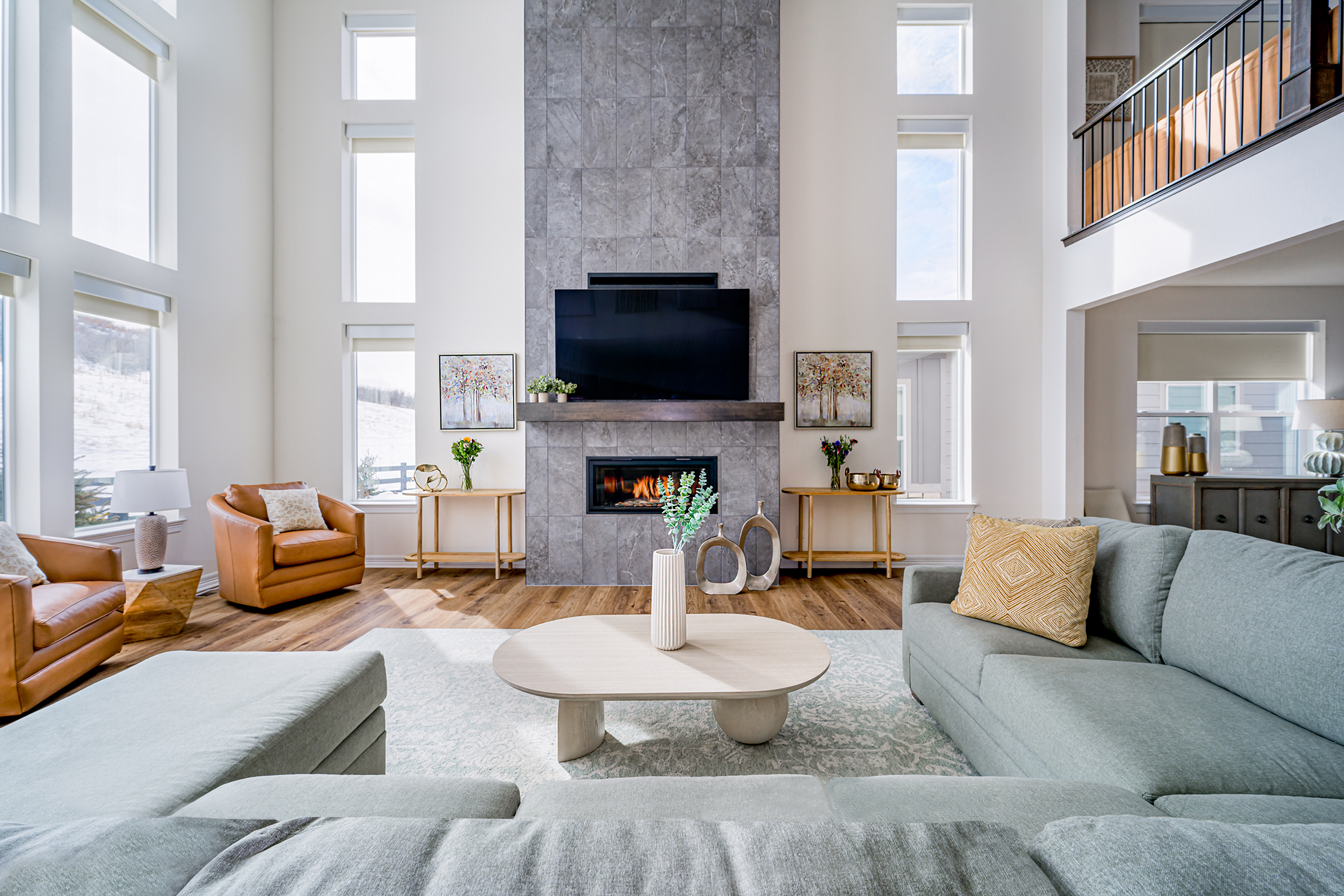 Contemporary family room in Greater Essex County by Valerie Ruddy.