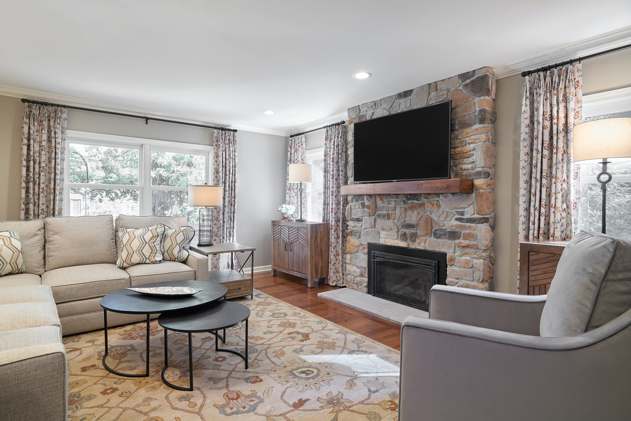 Living room for family home in Greater Essex County by Valerie Ruddy.